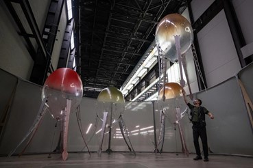 Anicka Yi fills Tate Modern’s Turbine Hall with giant floating robots and millennia-old odours